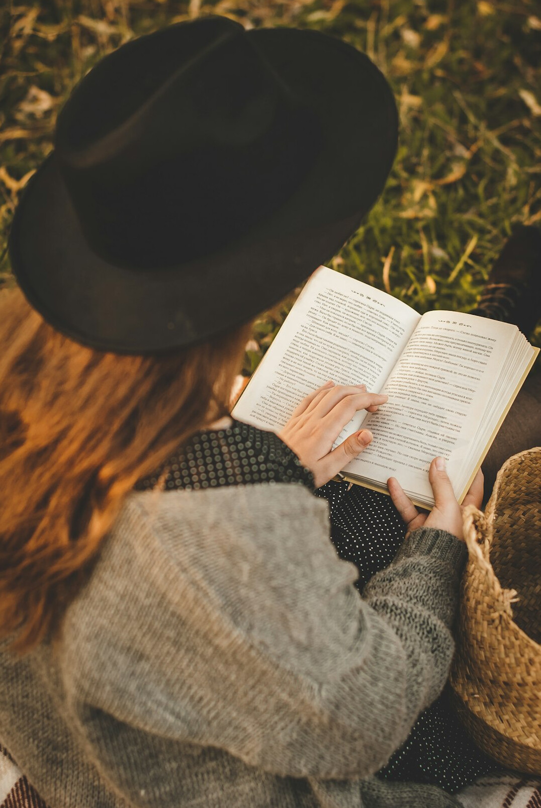 woman reading mystery book