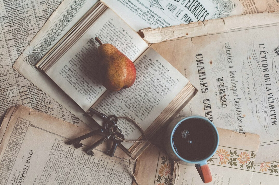 detective reading old book