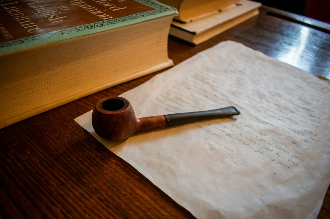 detective reading old book